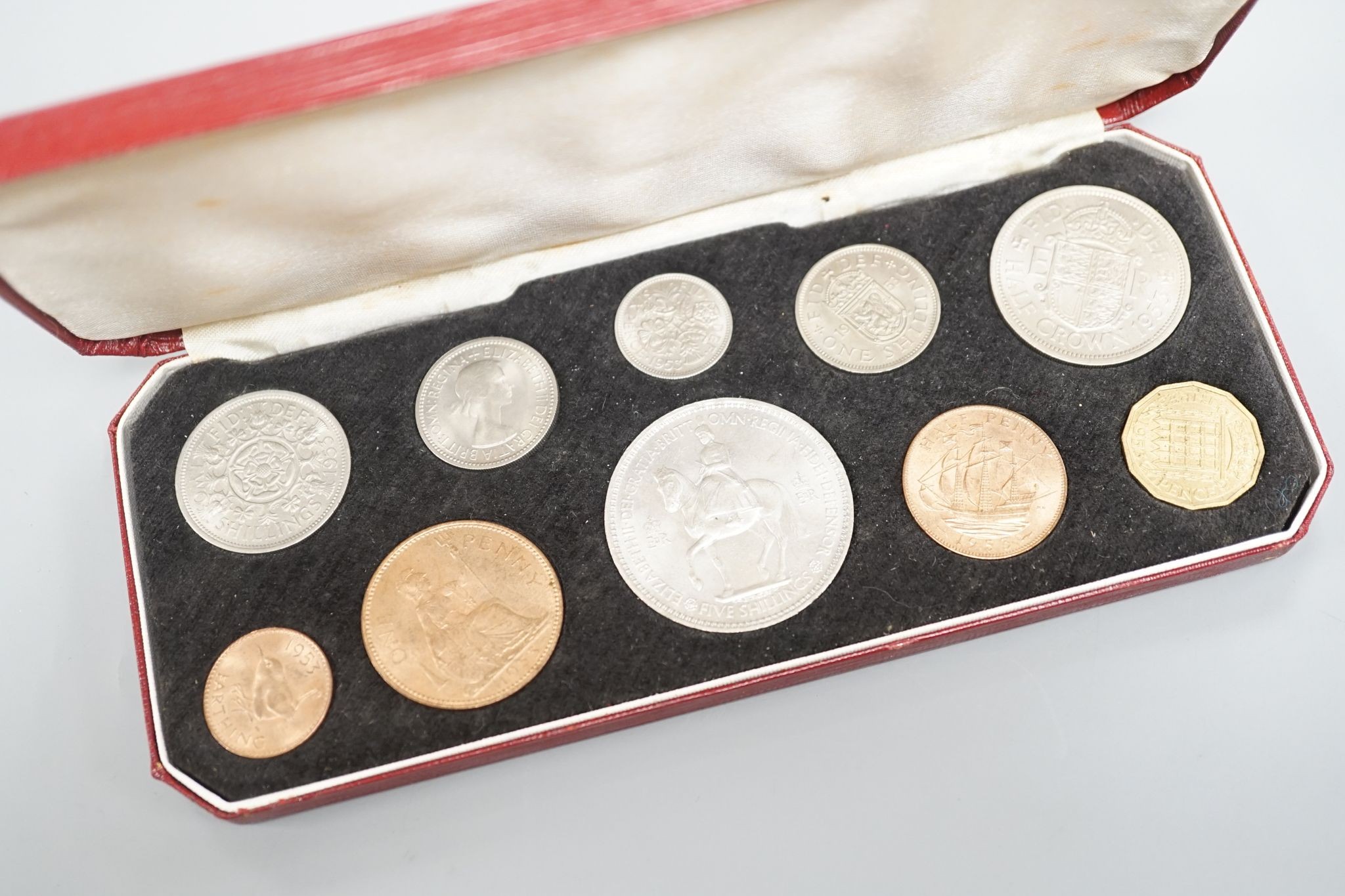 A Royal Mint Queen Elizabeth II cased set of coronation year coins 1953, UNC and a 1965 UNC set